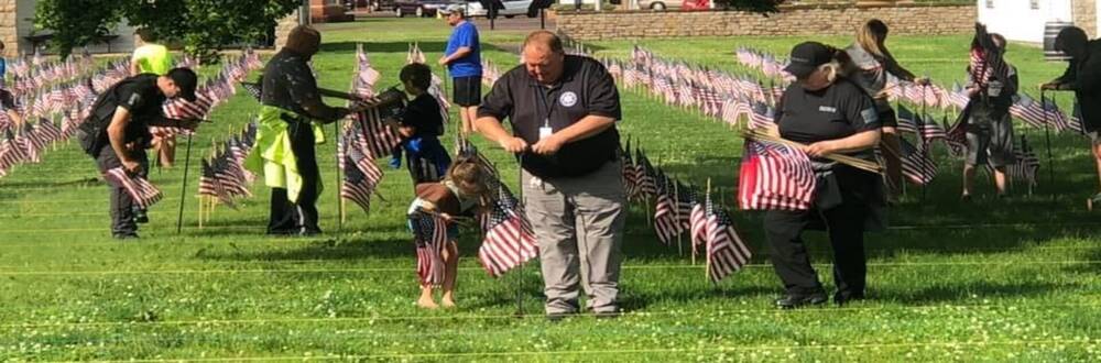 Placing flags at the Old Fort Historic Site for 9/11